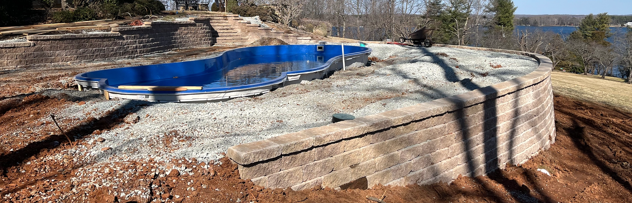 Retaining wall holding back a pool